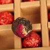 Té de primavera de material puro de árbol antiguo al por mayor Té Pu'er té Tuo de rosa té Tuo de rosa Pu'er caja bola de dragón hecha a mano