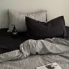 Juego de ropa de cama de cuatro piezas de algodón puro estilo Muji sábana de algodón funda de edredón rayas blancas y negras sensación de lujo ligero alta gama ropa de cama juego de tres piezas para dormitorio