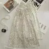 Falda midi floral de nicho suave y dulce para mujer, primavera/verano 2026, estilo coreano, de cintura alta, línea A adelgazante
