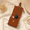 Bolsa de cuero con botón de presión, bolso de mano pequeño de cuero vintage, bolsa portátil para guardar labiales y joyas, admite logotipo personalizado
