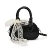 Bolso de Bowling de Moda de Nicho de Alta Apariencia para Mujer 2026 Nuevo Elegante Bolso de Hombro Cruzado con Relieve de Gama Alta