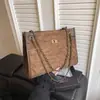 Bolsa Transfronteiriça de Camurça Feminina 2025 Nova Bolsa de Ombro com Corrente Transversal de Alto Padrão Bolsa Tote de Grande Capacidade