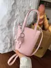 Bolso pequeño de diseño nicho transfronterizo 2026 nuevo modelo bolso tipo cubo para mujer, bolso de hombro único cruzado estilo japonés y coreano para el día a día