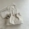 Bolsa feminina de grande capacidade para uso transfronteiriço, nova coleção outono 2026, bolsa de ombro versátil e elegante, bolsa tote moderna e casual para o trabalho e uso diário
