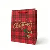 Bolsa de Tote Navideña exclusiva transfronteriza con diseño de árbol de Navidad, repujado en dorado, bolsa de papel para empaque reforzada, bolsa de regalo de alta gama