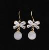 Aretes de Gancho Cero Lazo Zircón Moda Mujer Combinable Elegante Brillante Piedra Ojo de Gato Regalo para Niña Venta Directa
