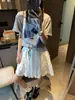 Moqie Diseño de Nicho Cuadros Parche Dibujos Animados Cachorro Cuello Redondo Holgado Aspecto Adelgazante Manga Corta Camiseta Mq0629