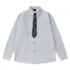 Camisa de Manga Larga con Patrón de Diamantes Creativo Estilo Americano para Hombres y Mujeres, Tendencia Nacional Primavera y Otoño Corte Holgado 2026 Camisa de Pareja
