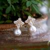 Pendientes de perlas y flores de cristal de lujo, ligeros y de moda transfronteriza europea y americana, nuevos pendientes de diseño de nicho, joyería de plata para mujer