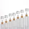 Botellas cuentagotas de vidrio transparente para aceites esenciales al por mayor, botellas dispensadoras cosméticas de gran capacidad de 50 ml, botellas de vidrio vacías portátiles esmeriladas