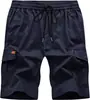 Bermudas Masculinas para Comércio Exterior Transfronteiriço 2026, Estilo Europeu e Americano, Caimento Solto, Cor Sólida, Corte Reto, Multibolsos, Bermudas Casuais de Cinco Pontos para Uso ao Ar Livre Atacado