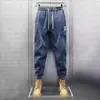 Pantalones de trabajo jeans elásticos para hombre sueltos cónicos casuales para hombre ropa para obra resistente al desgaste protección laboral pantalones de trabajo