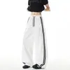 Pantalones deportivos de rayas estilo americano de secado rápido para hombre, pantalones rectos holgados de estilo retro universitario para street dance de primavera y otoño, pantalones de pierna ancha