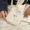 Nueva bolsa de agua caliente de dibujos animados linda de felpa, inyección de agua, bolsa de agua caliente, al por mayor, PVC grueso a prueba de explosiones, bolsa de agua caliente, extraíble y lavable