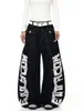 Jeans de Rua Personalizado Preto Americano Estampa de Letras Grandes Costura Dupla Retalhos Desconstruídos Calças Largas Scimitar Masculinas e Femininas