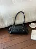Bolso de Mano de Cuero Suave Color Sólido Lujo Ligero para Mujer 2026 Nuevo de Gama Alta para el Trabajo Transfronterizo Simple Moda Bolso de Hombro Único para el Trabajo
