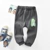 Pantalones casuales holgados para niños pequeños de primavera Pantalones para niños Pantalones Ins Estampado de dinosaurios Pantalones para niños de primavera y otoño Transfronterizo
