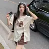 Camiseta Curta com Cordão e Fenda Estilo Coreano Feminina Verão 2024 Solta Tendência Design Ins com Senso de Design Top Irregular de Meia-manga
