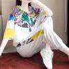2023 Verano nueva ropa de mujer moda holgada estilo occidental reductor de edad traje deportivo casual con capucha estampado conjunto de dos piezas