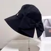 Sombrero de pescador de moda con lazo trasero para mujer, casual de verano, versátil, protección solar, sombrero tipo cubo, hace que la cara se vea más pequeña, sombrero de tela para el sol