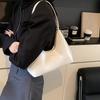Textura de alta calidad Retro Bolso pequeño de mujer 2025 Nueva moda Sobaco Portátil Bolso de mujer Elegante Bolso de hombro bandolera