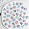Venta al por mayor más vendido animal galleta queso cachorro gato uña joyería resina tridimensional ins dibujos animados accesorios para uñas