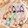 Nueva cuerda de silicona colorida con accesorio de campanilla de flor pequeña, llavero fresco y simple, decoración para bolso de mujer, venta al por mayor