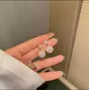 Pendientes de botón de perla de plata de ley 925, Versátiles y elegantes, Pendientes nuevos de moda para mujer, Pendientes de botón al por mayor que son suaves para los lóbulos de las orejas