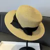 Sombrero de paja de ala plana estilo francés para mujer, nuevo sombrero de sol de verano para la playa 26, sombrero de protección solar para mujer, sombrero de sol fedora tejido