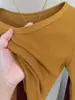 Camiseta Base de Algodón Canalé Naranja Calabaza Adelgazante con Cuello en V para Mujer, Versátil Top de Manga Larga Moda Primavera/Verano 2026