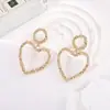Pendientes de moda con diamantes de imitación para mujer, aretes con forma de corazón hueco de hada y diamantes de imitación, venta al por mayor
