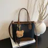 Bolso Cubo de Nicho Nuevo para Mujer Verano 2026, Estilo Simple y de Alta Gama, Bolso de Hombro Cruzado Individual, Piel Suave de Venta Caliente Estilo Coreano
