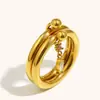 Joia de Mão Cruzada Europeia e Americana Elegante, Personalizada e Criativa Aço Inoxidável Banhado a Ouro 18K Camada Dupla Ultra-Fina Anel de Zircônia Gota d'Água para Mulheres Nicho