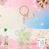 Llavero Creativo de Arena Líquida Flor de Cerezo Popular Colgante de Pétalo Acrílico para Bolsa Regalo para Pareja Mochila Venta al por Mayor