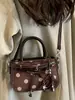 Bolsa retrô fashion de bolinhas de nicho 2026 nova bolsa transversal casual feminina bolsa de mão estilosa, requintada e única