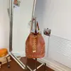 2026 Verano Nuevo Vintage Moderno Remaches Bolso de Mano Moda Bolso Cubo Estiloso Relajado Único Bolso de Hombro