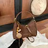 Bolso de Mujer Casual Estilo Coreano de Cuero y Felpa 2026 Otoño/Invierno Nuevo Versátil de Alta Gama Gran Capacidad para Viajes Diarios Bolso de Hombro Único Bolso Tote