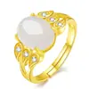 Temperamento anillo de tres hojas con incrustaciones de material de imitación Qinghai jade Hetian huevo anillo de superficie abierto temperamento espinaca verde anillo de calcedonia