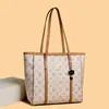 Bolso tipo cubo con estampado de diseño de nicho popular este año, bandolera y de hombro, nuevo y elegante bolso de mano de gran capacidad para mujer 2026