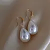 Brincos de Pérola Elegantes Simples Estilo Chinês Personalizado Elegante Leve Luxo Temperamento Joia de Orelha Moda Versátil High-End Gancho de Orelha