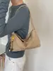 Outono/Inverno 2026 Novo Estilo Coreano Simples Moda Retrô Bolsa de Mão para o Trabalho Tendência Versátil Bolsa de Ombro Único para Sobrancelha