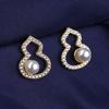 2021 nuevos aretes pequeños de temperamento simple estilo coreano de calabaza de perla de venta caliente accesorios para las orejas de lujo ligero francés al por mayor