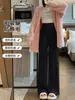 Nova coleção de outono e inverno estilo coreano: Calças pantalona de alta qualidade, com corte solto, macias e confortáveis para mulheres, apresentando um design relaxado e fluido com malha no comprimento do chão
