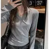 Diseño de cuello en V de fábrica, camiseta de manga larga combinada para mujer, nuevo estilo coreano Dongdaemun de principios de otoño, corte ajustado, top versátil