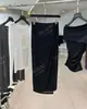 DestacadoCorriste 26 Primavera/Verano Nuevo Llegada Hilo Importado Wrap Hombro Único Hombro Diagonal Fruncido Conjunto de Top y Falda