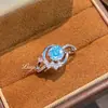 Anel de Lua Rose Cut de Água-Marinha Octogonal Millennium, uma peça moderna e luxuosa apresentando diamantes de alto carbono e um design de estrela e lua Paraíba