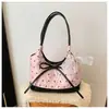 Bolsa Transversal Laço Commute Novo Estilo Primavera Verão Bolsa de Axila Personalidade Feminina Casual Versátil Compras Fofa Feminina Bolsa de Ombro Único