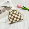 Bolsa de Corduroy a Cuadros con Cordón Bolsa de Almacenamiento para Cosméticos Bolsa de Regalo para Comercio Electrónico Transfronterizo Bolsa de Almacenamiento Bolsa Tote de Regalo