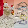 Colgante pequeño de oro puro 999 "Te amo por diez mil años", serie Labubu, con cordón para colgar, un regalo promocional para tiendas de oro
