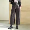 Calça Pantalona Cropped em Couro PU Feminina 2026 Outono/Inverno Nova Cintura Alta Emagrecedora Calça de Nove Pontos Elegante Versátil Casual Calça de Couro